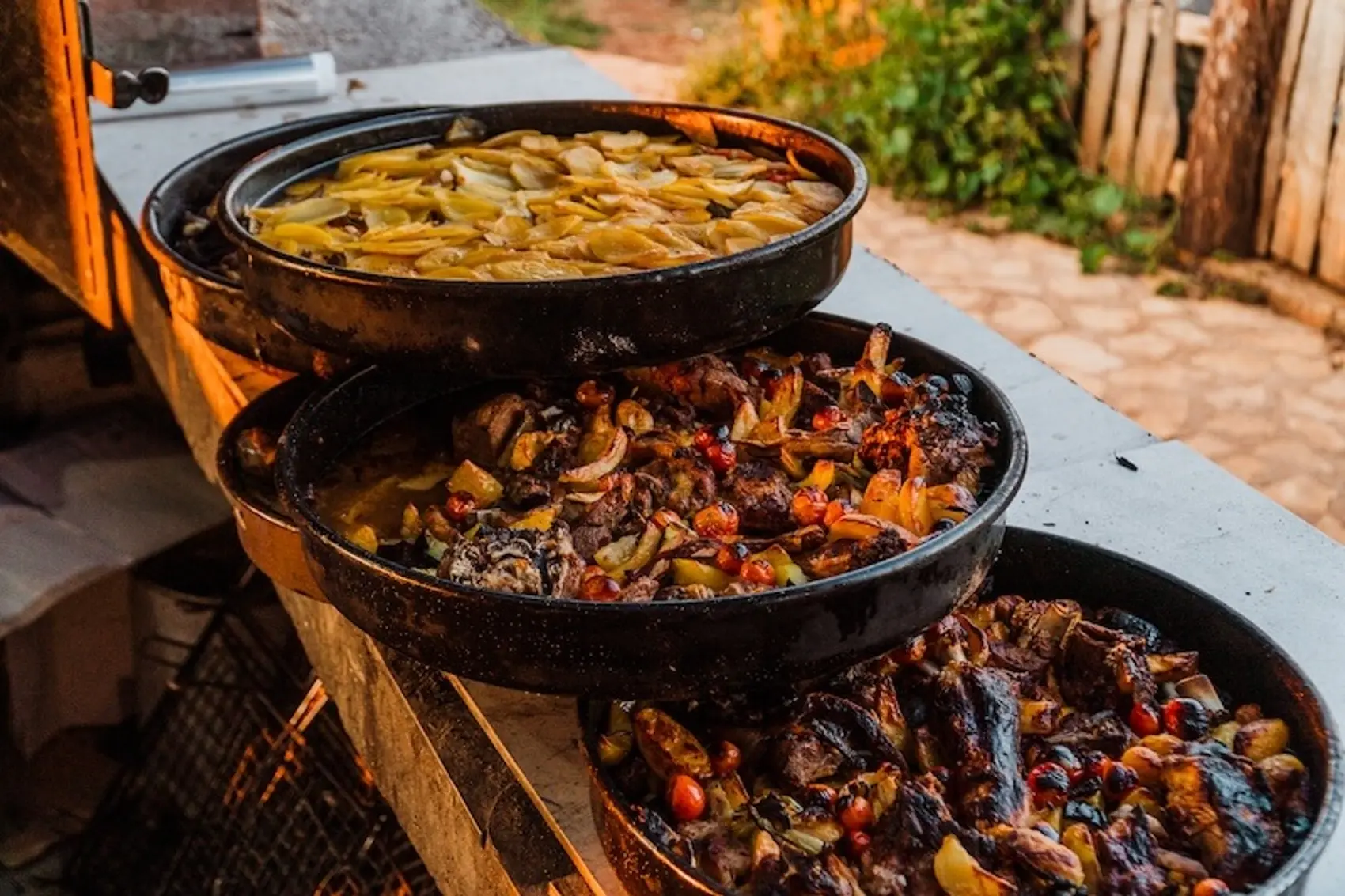 Traditional Croatian cuisine Peka, with slow roasted vegetables and lamb or veal.